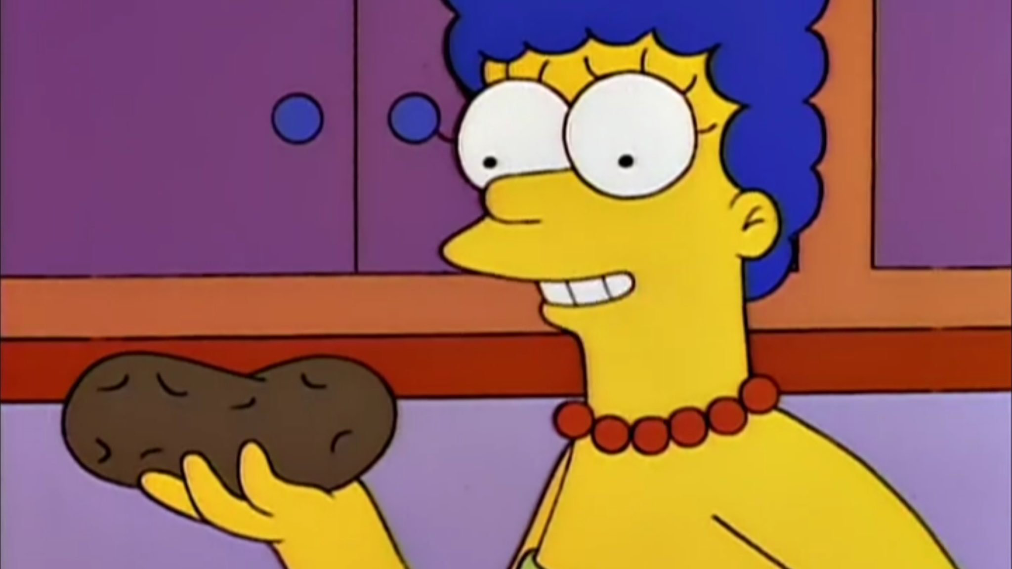 An image of Marge Simpson holding a potato saying I just think they're neat.